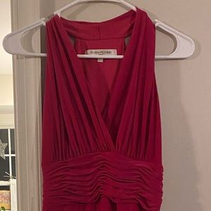 Pink women’s dress. Knee length or right below. Good condition. Size 4